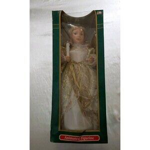 Animated Figurine ( Trim A Home) White And Gold In Color Hilding Candle.........